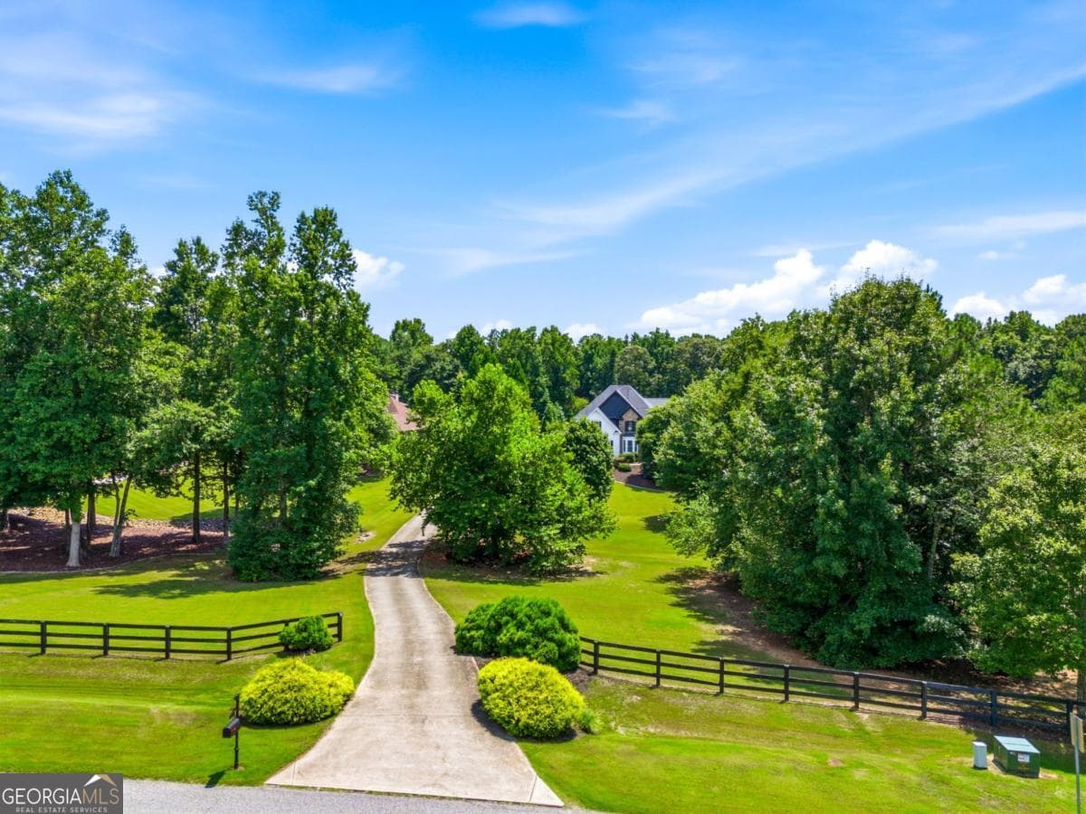 8 bedroom, 5.5 bathroom, 6,240 sq ft single family residence for sale at 124 Savanna Estates Drive, Canton, GA 30115 — photo 1 of 100