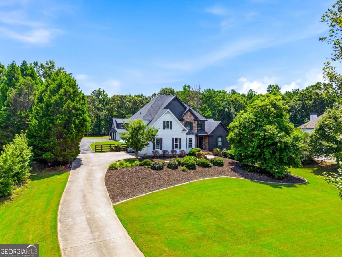 8 bedroom, 5.5 bathroom, 6,240 sq ft single family residence for sale at 124 Savanna Estates Drive, Canton, GA 30115 — photo 5