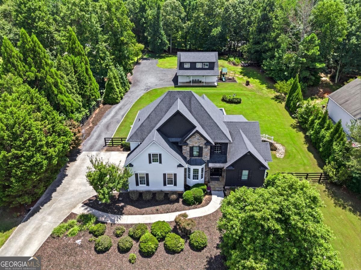 8 bedroom, 5.5 bathroom, 6,240 sq ft single family residence for sale at 124 Savanna Estates Drive, Canton, GA 30115 — photo 9
