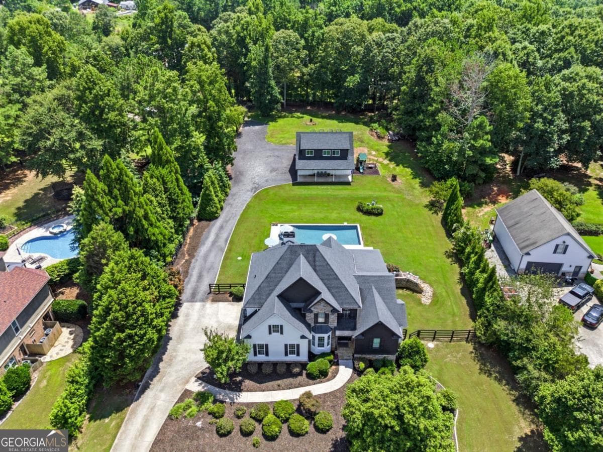 8 bedroom, 5.5 bathroom, 6,240 sq ft single family residence for sale at 124 Savanna Estates Drive, Canton, GA 30115 — photo 10