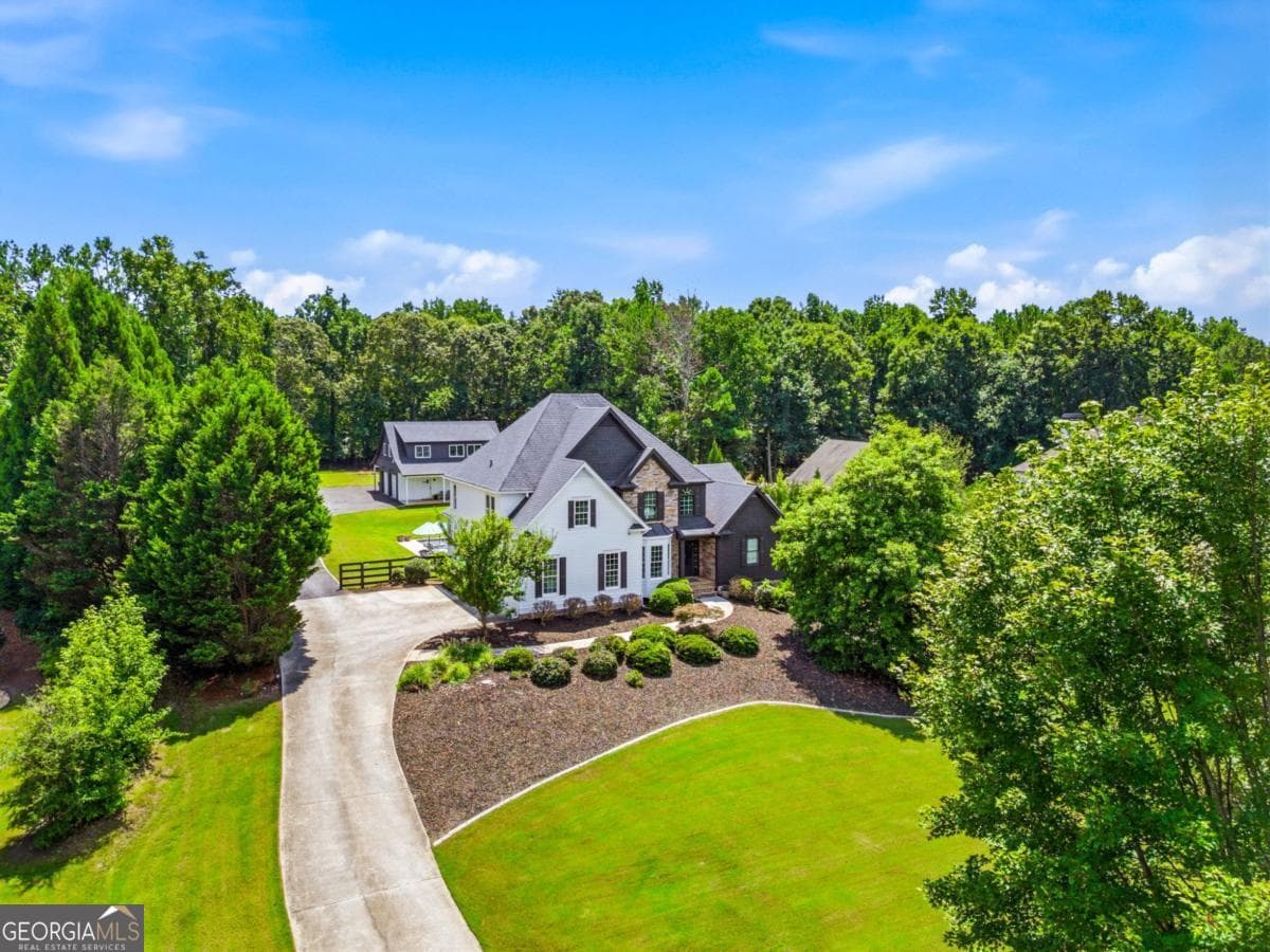 8 bedroom, 5.5 bathroom, 6,240 sq ft single family residence for sale at 124 Savanna Estates Drive, Canton, GA 30115 — photo 4
