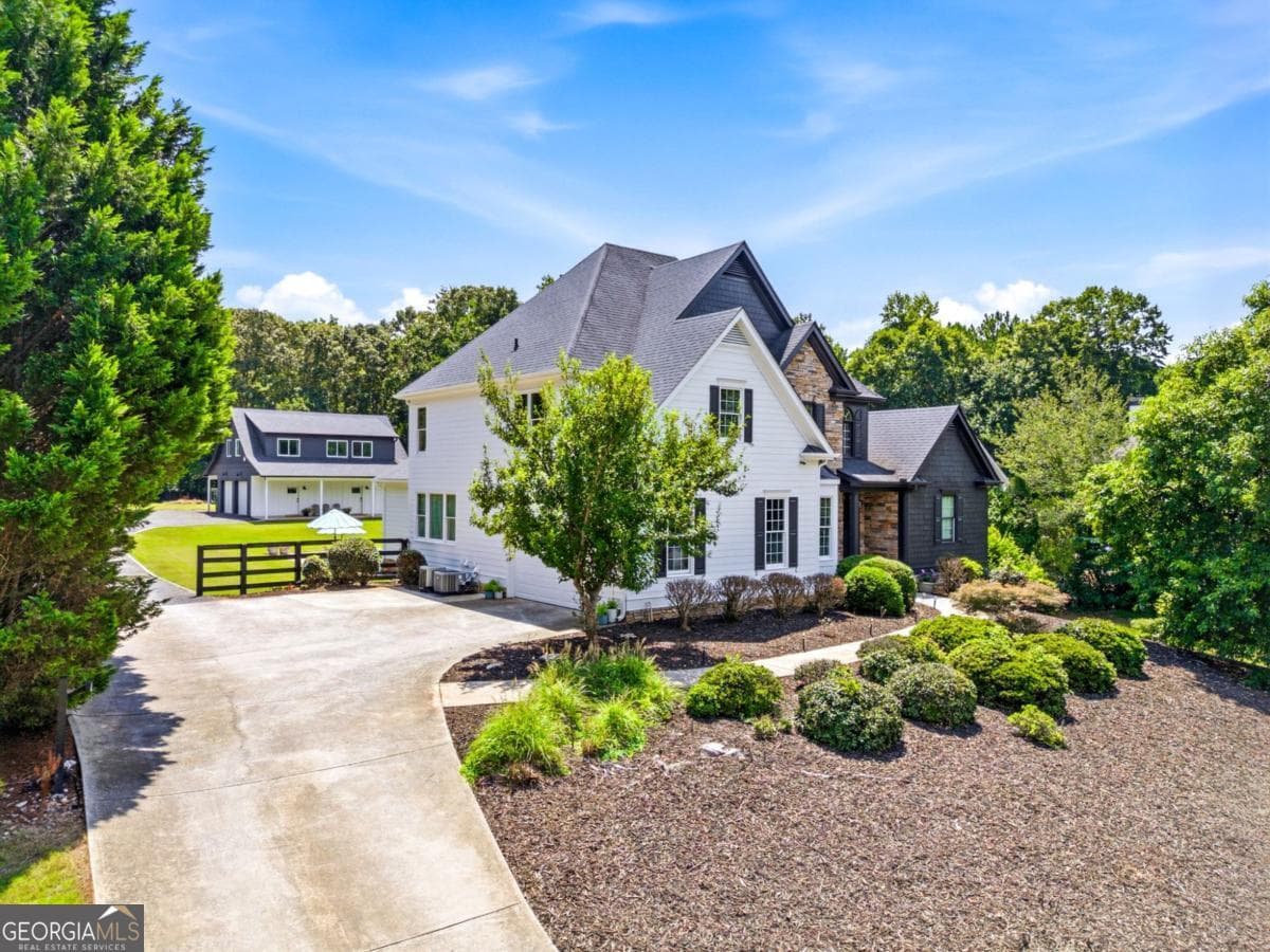 8 bedroom, 5.5 bathroom, 6,240 sq ft single family residence for sale at 124 Savanna Estates Drive, Canton, GA 30115 — photo 8