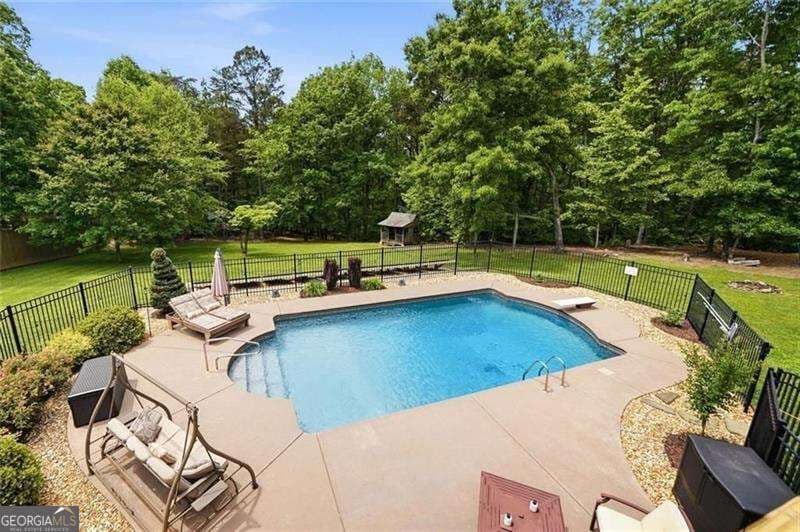 5 bedroom, 3.5 bathroom, 5,346 sq ft single family residence for sale at 2235 Lower Burris Road, Canton, GA 30114 — photo 2
