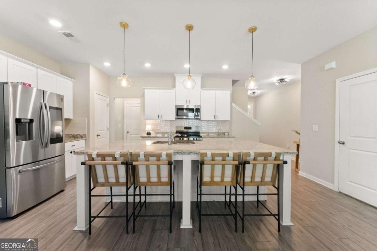 3 bedroom, 2.5 bathroom, 1,898 sq ft townhouse for sale at 1969 Lanier Harbor Point, Buford, GA 30518 — photo 6