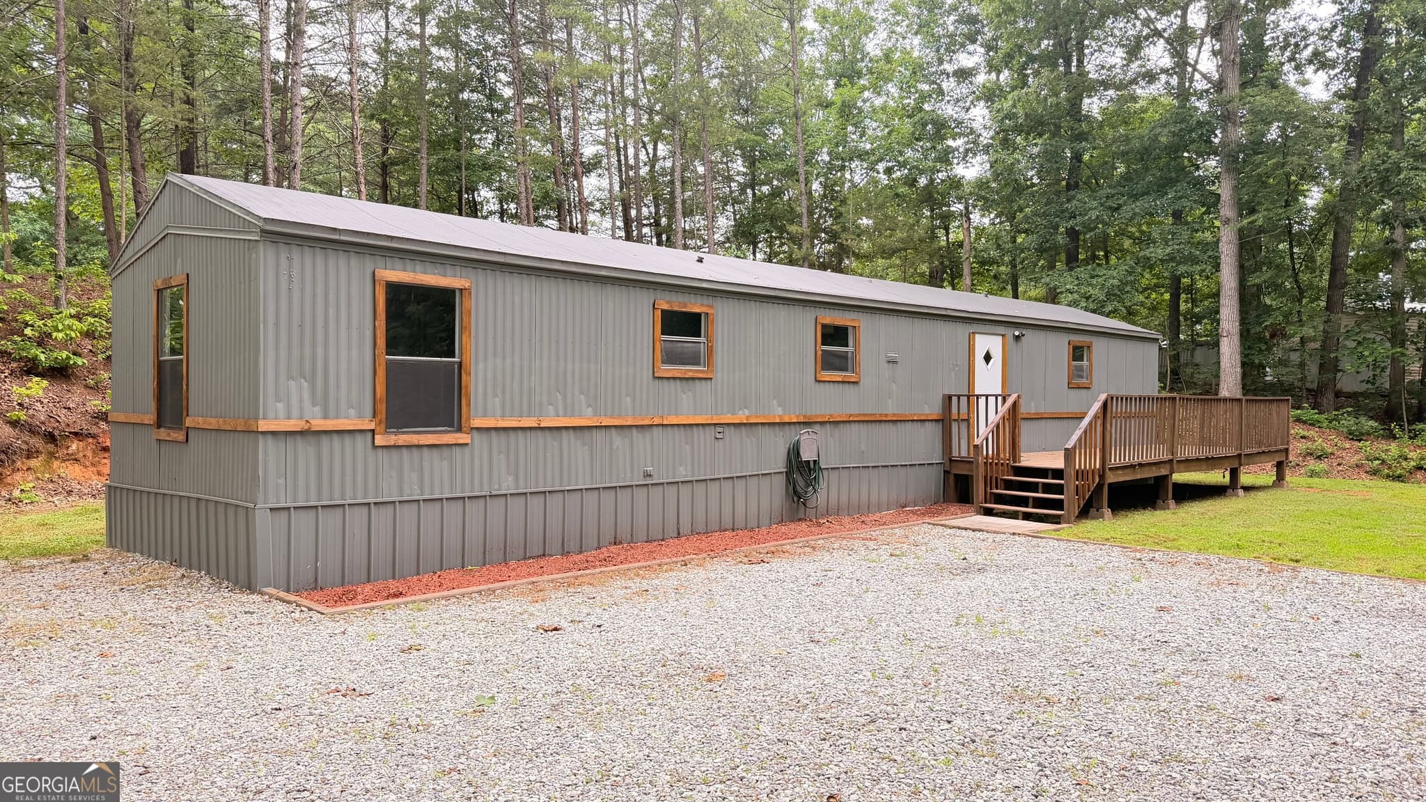 2 bedroom, 2 bathroom, 840 sq ft manufactured home,single family residence sold at 11 Iberian Road, Dahlonega, GA 30533