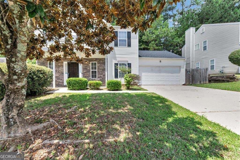 3 bedroom, 2.5 bathroom single family residence for rent at 5745 Old Carriage Drive, Atlanta, GA 30349 for $2,100 a month — photo 2