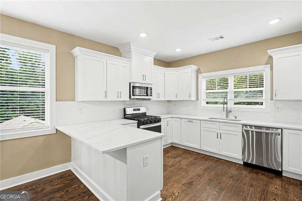 4 bedroom, 2.5 bathroom, 2,312 sq ft single family residence for sale at 229 Little Brook Lane, Woodstock, GA 30188 — photo 5