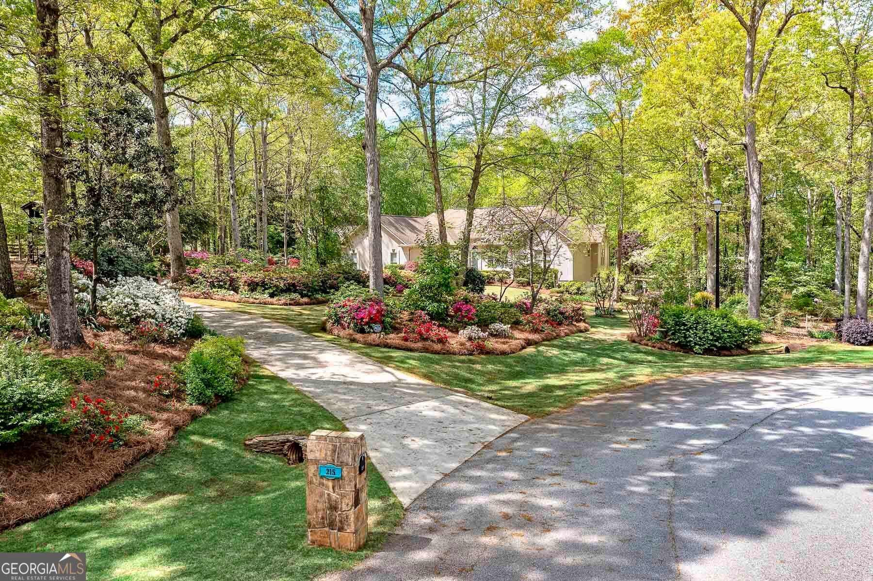 5 bedroom, 4.5 bathroom, 5,000 sq ft single family residence sold at 215 Oakwood Lakes Drive, Hampton, GA 30228