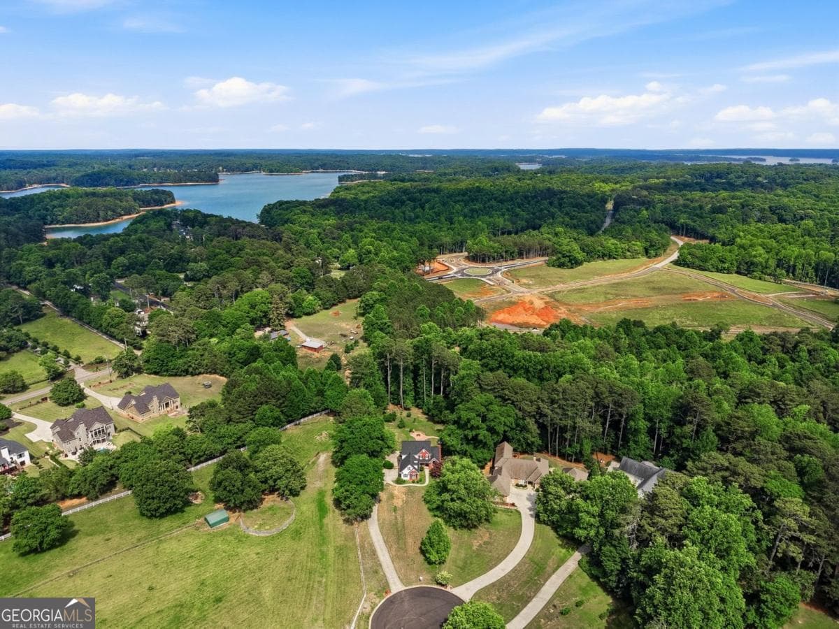 4 bedroom, 4.5 bathroom, 2,690 sq ft single family residence sold at 6110 Robbs Crossing Drive, Cumming, GA 30041