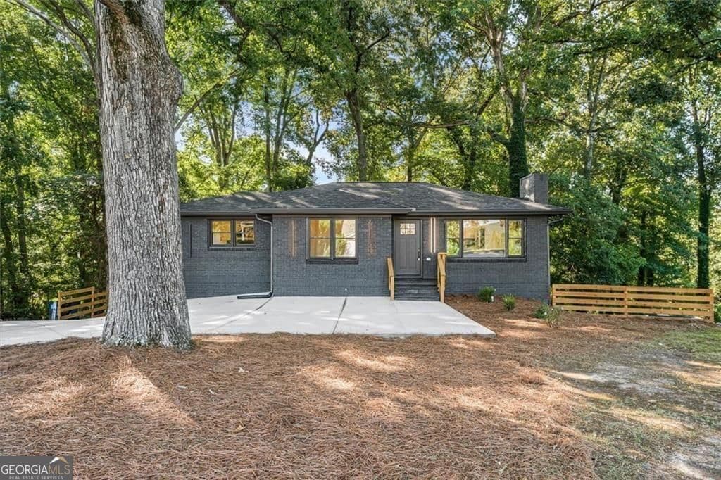 4 bedroom, 3 bathroom, 2,340 sq ft single family residence for sale at 6025 Oakdale Road, Mableton, GA 30126 — photo 2