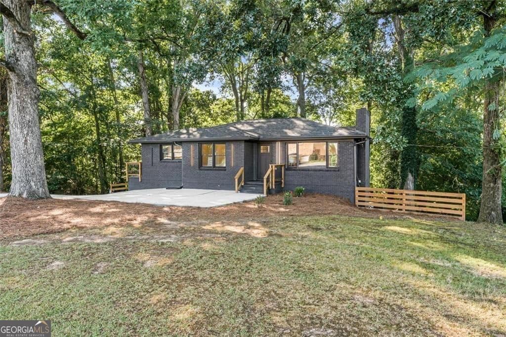 4 bedroom, 3 bathroom, 2,340 sq ft single family residence for sale at 6025 Oakdale Road, Mableton, GA 30126 — photo 3