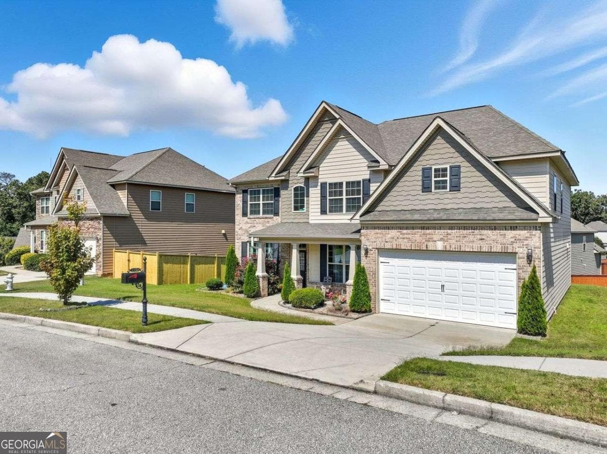 5 bedroom, 3 bathroom, 3,590 sq ft single family residence for sale at 1132 Cotton Oak Drive, Lawrenceville, GA 30045 — photo 2