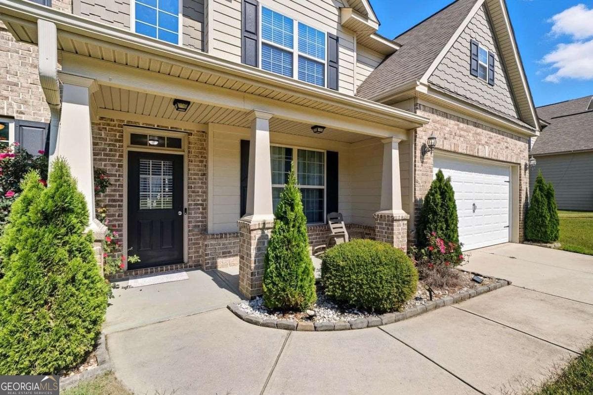 5 bedroom, 3 bathroom, 3,590 sq ft single family residence for sale at 1132 Cotton Oak Drive, Lawrenceville, GA 30045 — photo 3