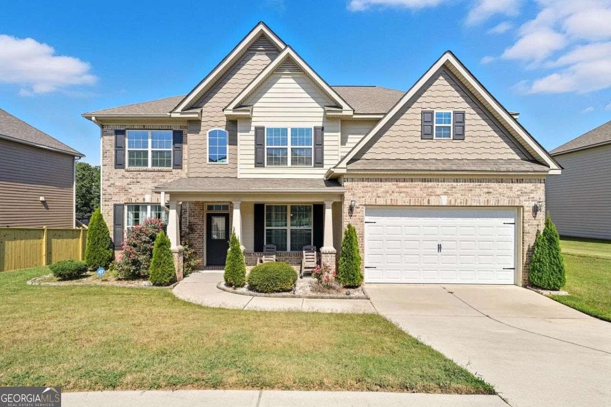 5 bedroom, 3 bathroom, 3,590 sq ft single family residence for sale at 1132 Cotton Oak Drive, Lawrenceville, GA 30045