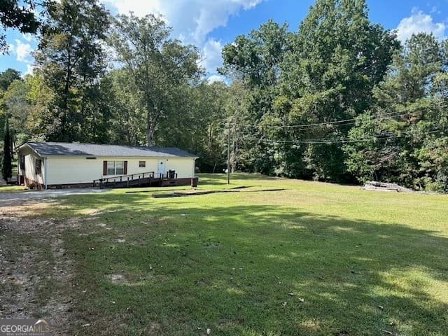 3 bedroom, 2 bathroom, 2,144 sq ft cabin,manufactured home,single family residence for sale at 112 W Little River Court, Eatonton, GA 31024 — photo 3