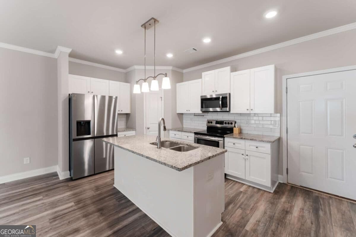 3 bedroom, 2.5 bathroom, 1,732 sq ft townhouse for sale at 4401 Fulson Drive, Lilburn, GA 30047 — photo 3