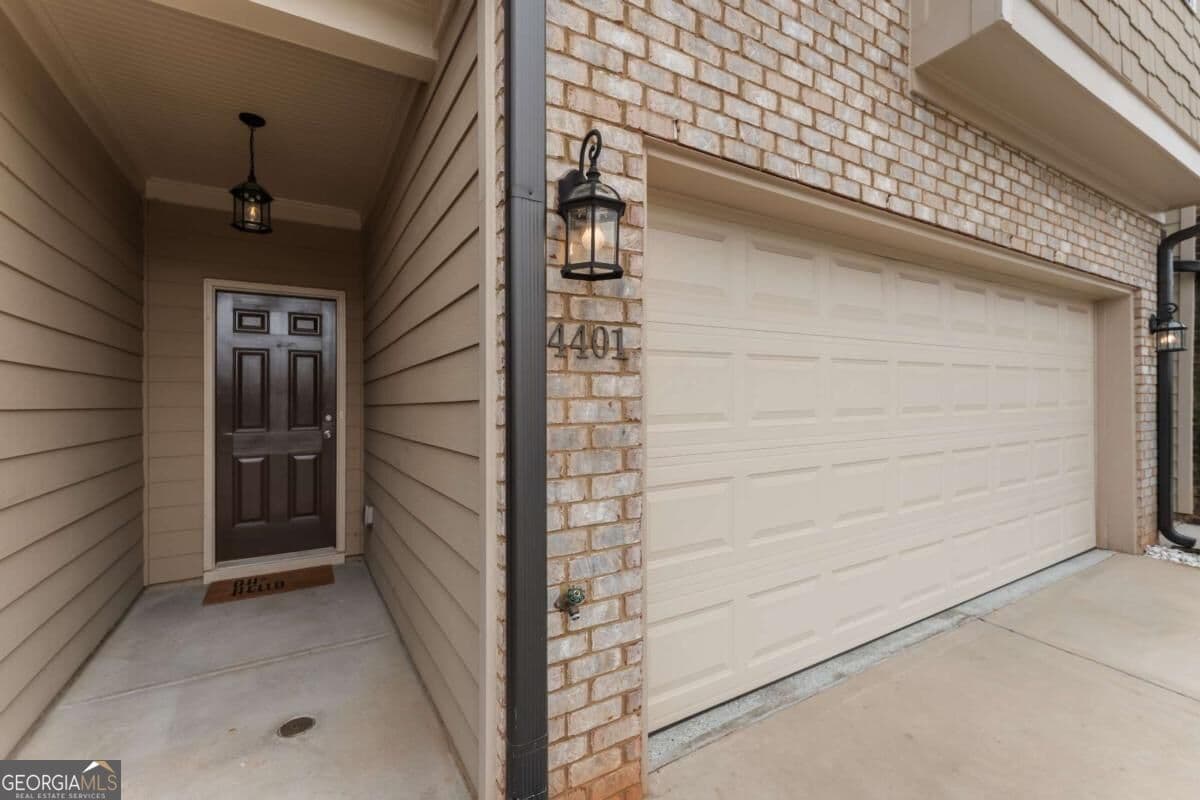 3 bedroom, 2.5 bathroom, 1,732 sq ft townhouse for sale at 4401 Fulson Drive, Lilburn, GA 30047 — photo 1 of 43