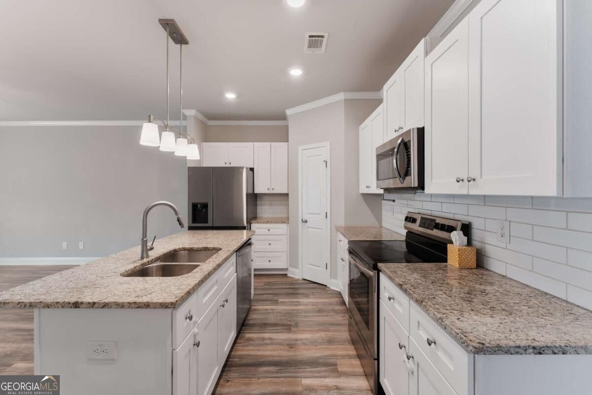 3 bedroom, 2.5 bathroom, 1,732 sq ft townhouse for sale at 4401 Fulson Drive, Lilburn, GA 30047 — photo 5