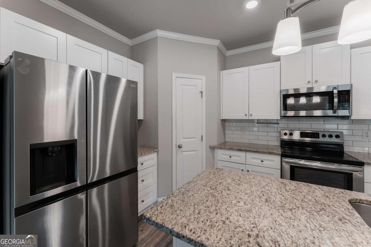 3 bedroom, 2.5 bathroom, 1,732 sq ft townhouse for sale at 4401 Fulson Drive, Lilburn, GA 30047 — photo 9