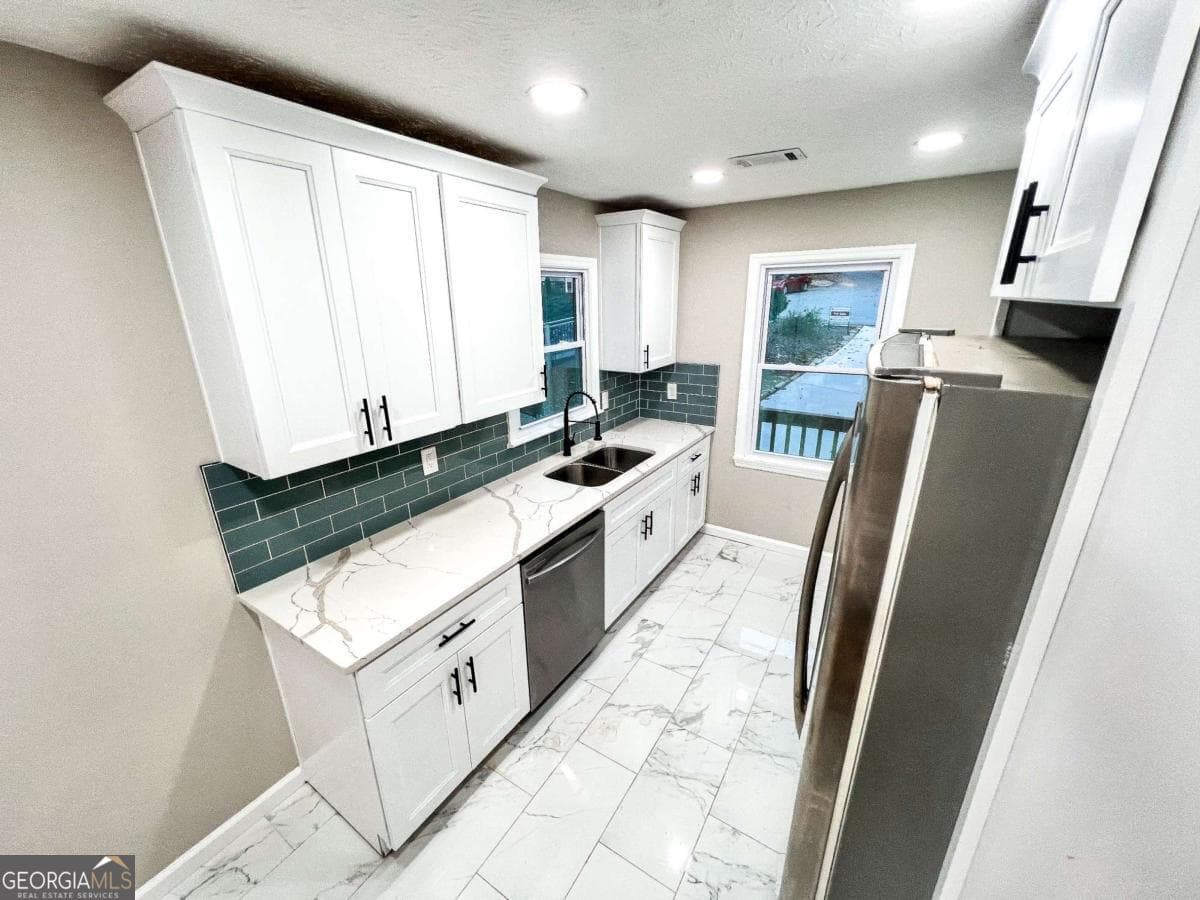 4 bedroom, 3 bathroom single family residence for sale at 6875 Graves Mill Court, Norcross, GA 30093 — photo 7