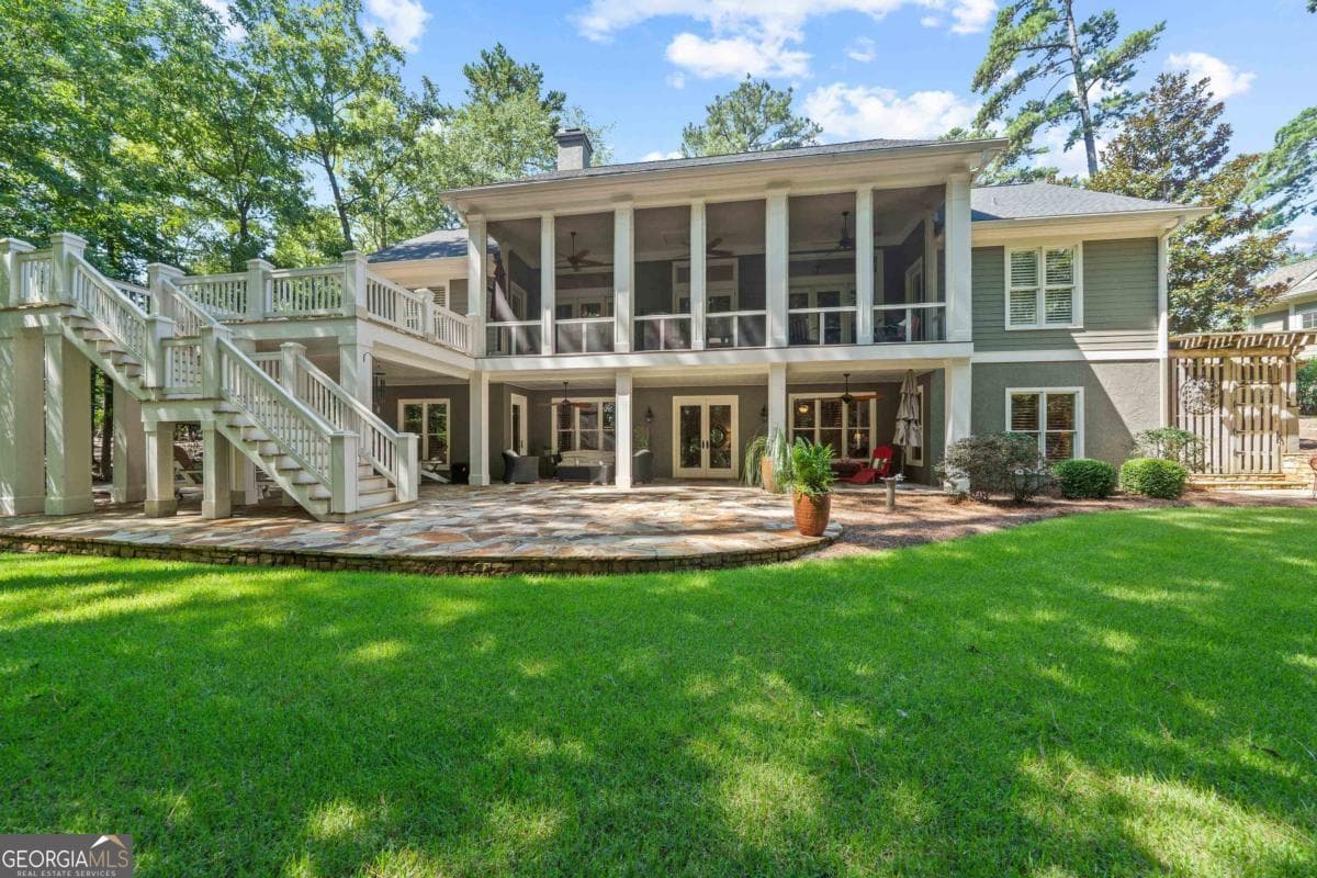 4 bedroom, 3.5 bathroom, 4,031 sq ft single family residence for sale at 1071 Eaglewood Way, Greensboro, GA 30642 — photo 2