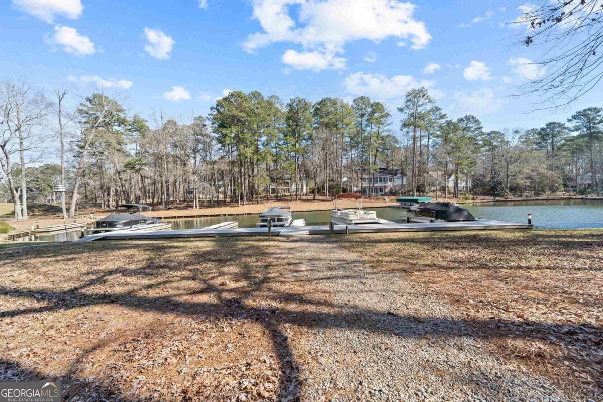 4 bedroom, 3.5 bathroom, 4,031 sq ft single family residence for sale at 1071 Eaglewood Way, Greensboro, GA 30642 — photo 4