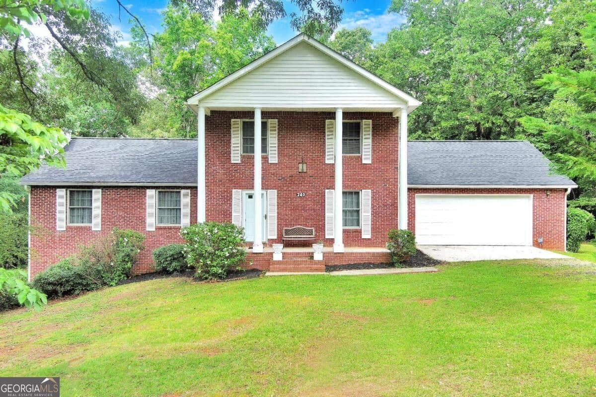4 bedroom, 2.5 bathroom, 2,138 sq ft single family residence for sale at 240 Riverview Road, Jackson, GA 30233 — photo 2