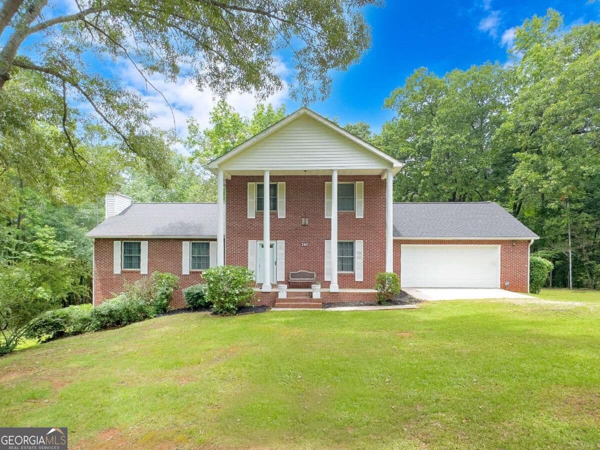 4 bedroom, 2.5 bathroom, 2,138 sq ft single family residence for sale at 240 Riverview Road, Jackson, GA 30233 — photo 1 of 75