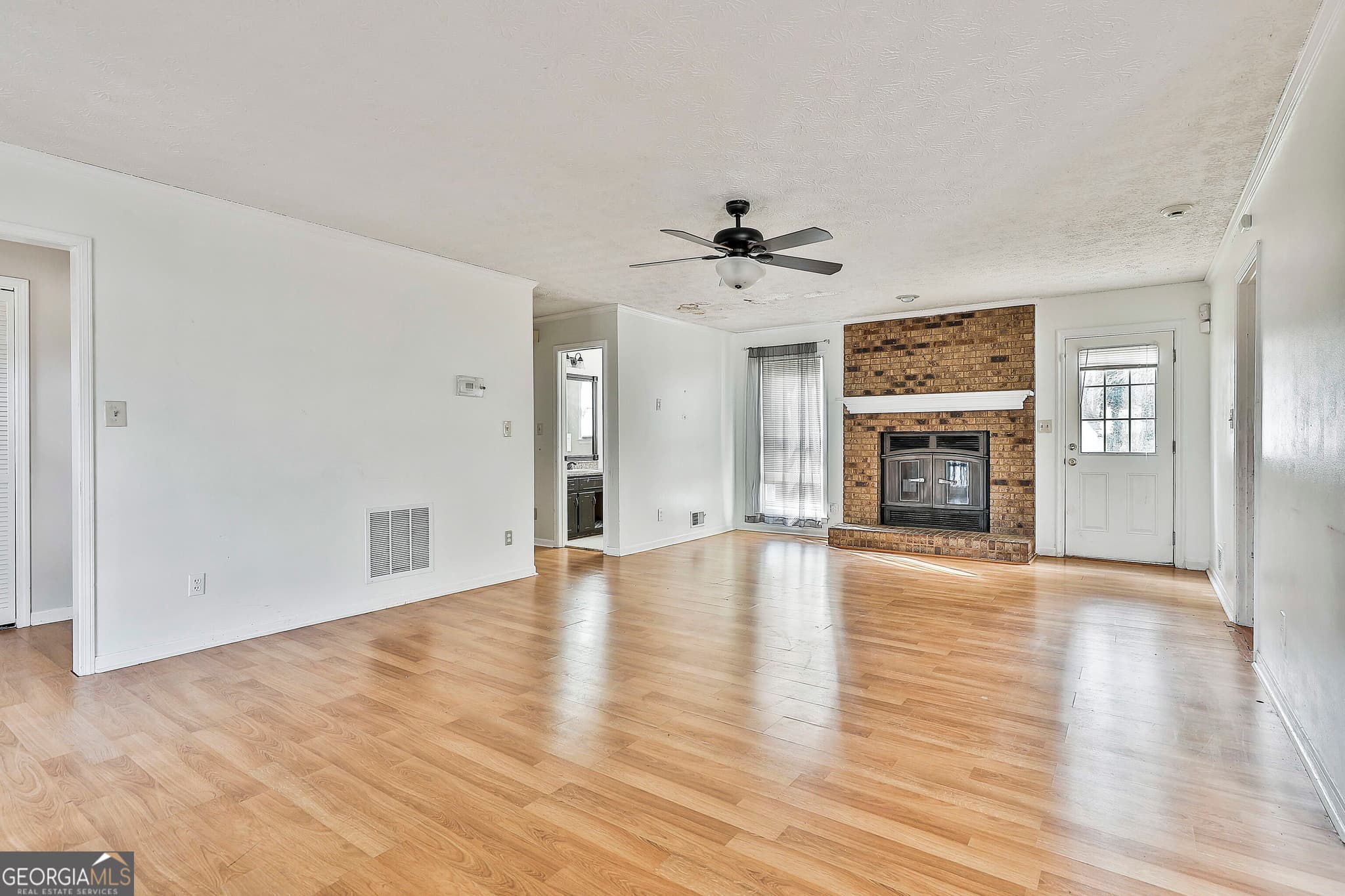 3 bedroom, 2.5 bathroom, 2,153 sq ft single family residence for sale at 8039 Woods Lane, Jonesboro, GA 30236 — photo 7