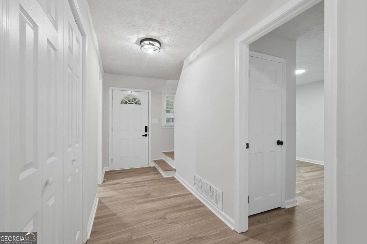 5 bedroom, 3 bathroom, 1,912 sq ft single family residence for sale at 5139 Merry Lane, Gainesville, GA 30504 — photo 8