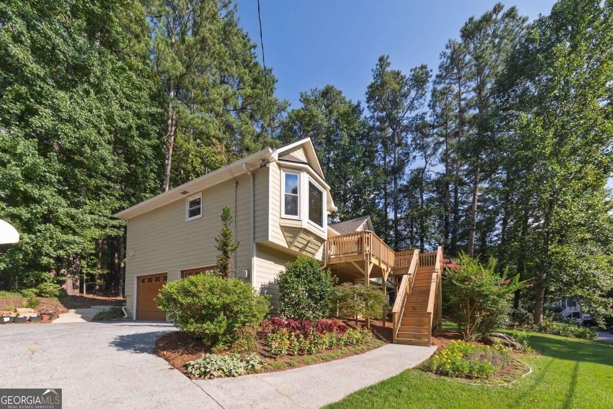 4 bedroom, 3 bathroom, 2,242 sq ft single family residence for sale at 2363 Wilderness Way, Marietta, GA 30066 — photo 2