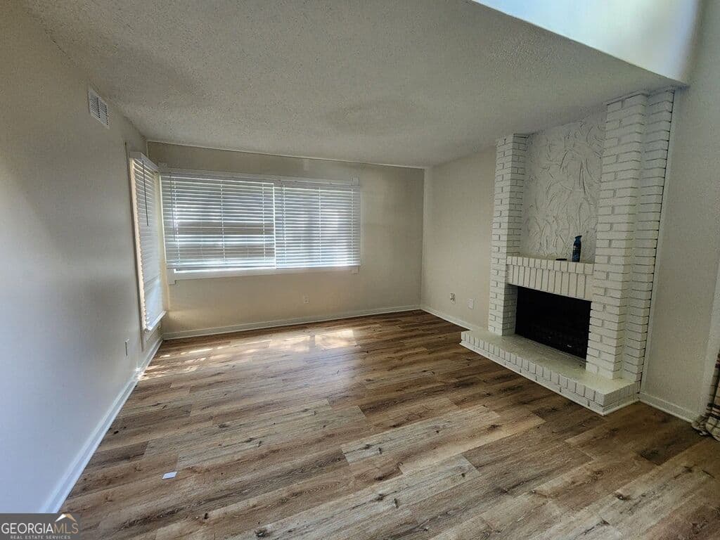 2 bedroom, 1.5 bathroom, 1,590 sq ft condominium for sale at 1086 Village Road, Stone Mountain, GA 30088 — photo 3