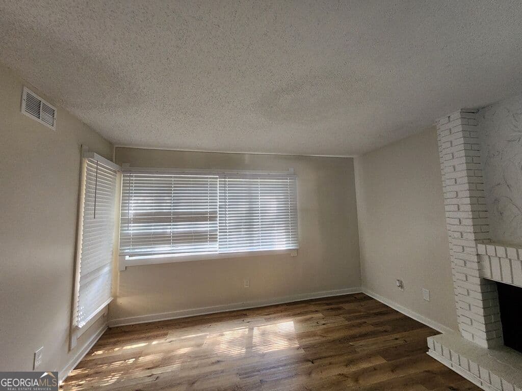 2 bedroom, 1.5 bathroom, 1,590 sq ft condominium for sale at 1086 Village Road, Stone Mountain, GA 30088 — photo 9