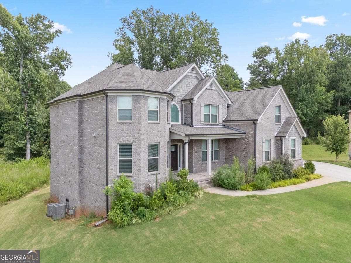 5 bedroom, 4 bathroom, 3,932 sq ft single family residence for sale at 4145 Gold Hill Lane, Cumming, GA 30040 — photo 3