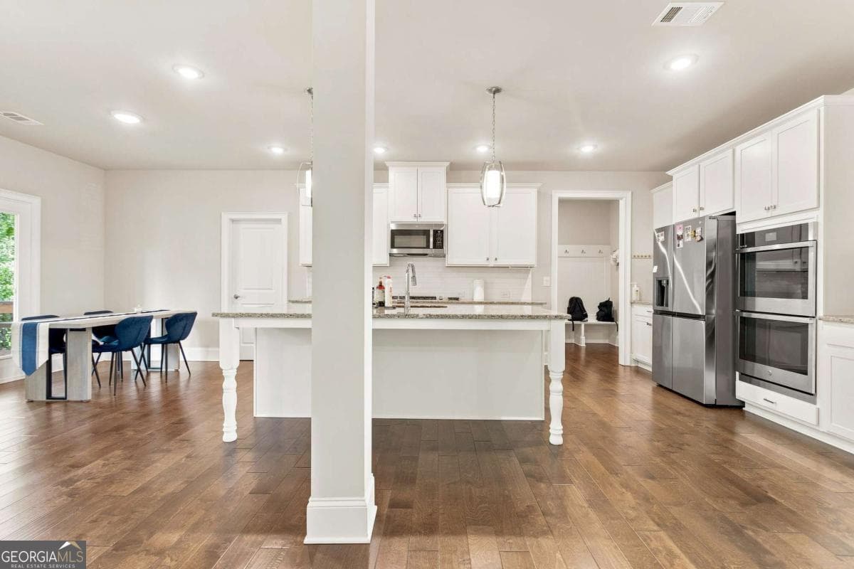 5 bedroom, 4 bathroom, 3,932 sq ft single family residence for sale at 4145 Gold Hill Lane, Cumming, GA 30040 — photo 5
