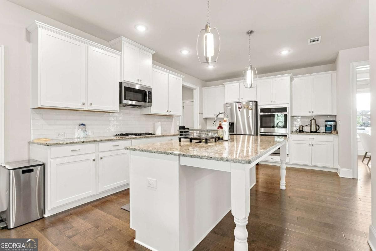 5 bedroom, 4 bathroom, 3,932 sq ft single family residence for sale at 4145 Gold Hill Lane, Cumming, GA 30040 — photo 4