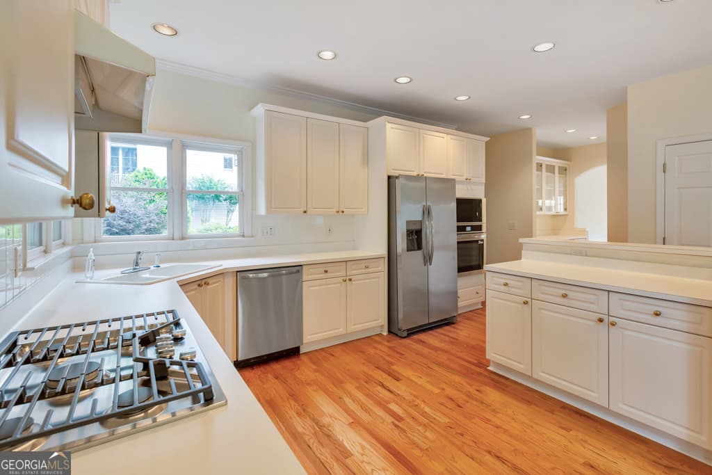 4 bedroom, 2.5 bathroom, 3,259 sq ft single family residence for sale at 2613 Winterthur Main, Kennesaw, GA 30144 — photo 3