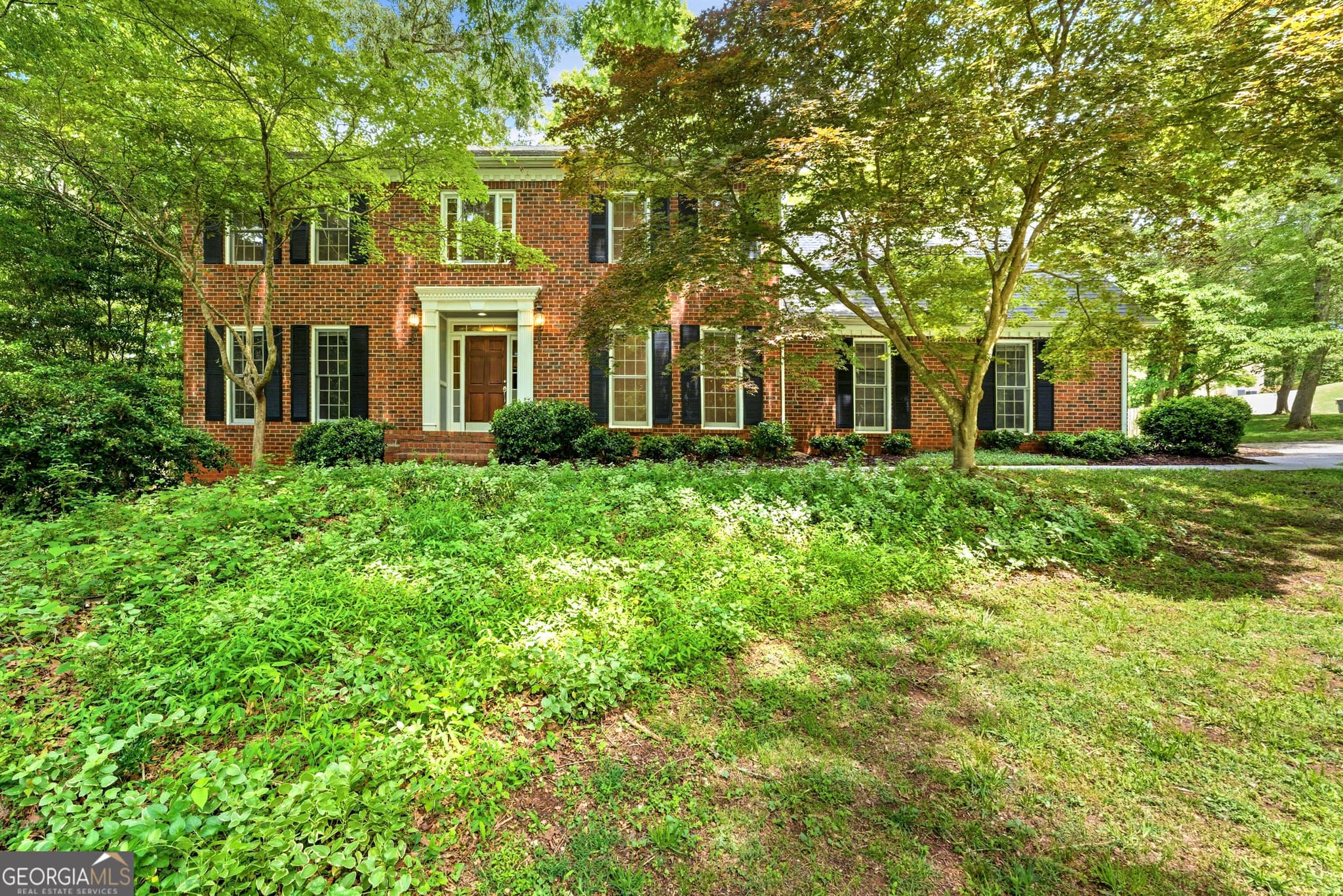 5 bedroom, 2.5 bathroom, 3,458 sq ft single family residence for sale at 100 Lakemont Circle, Fayetteville, GA 30215 — photo 2