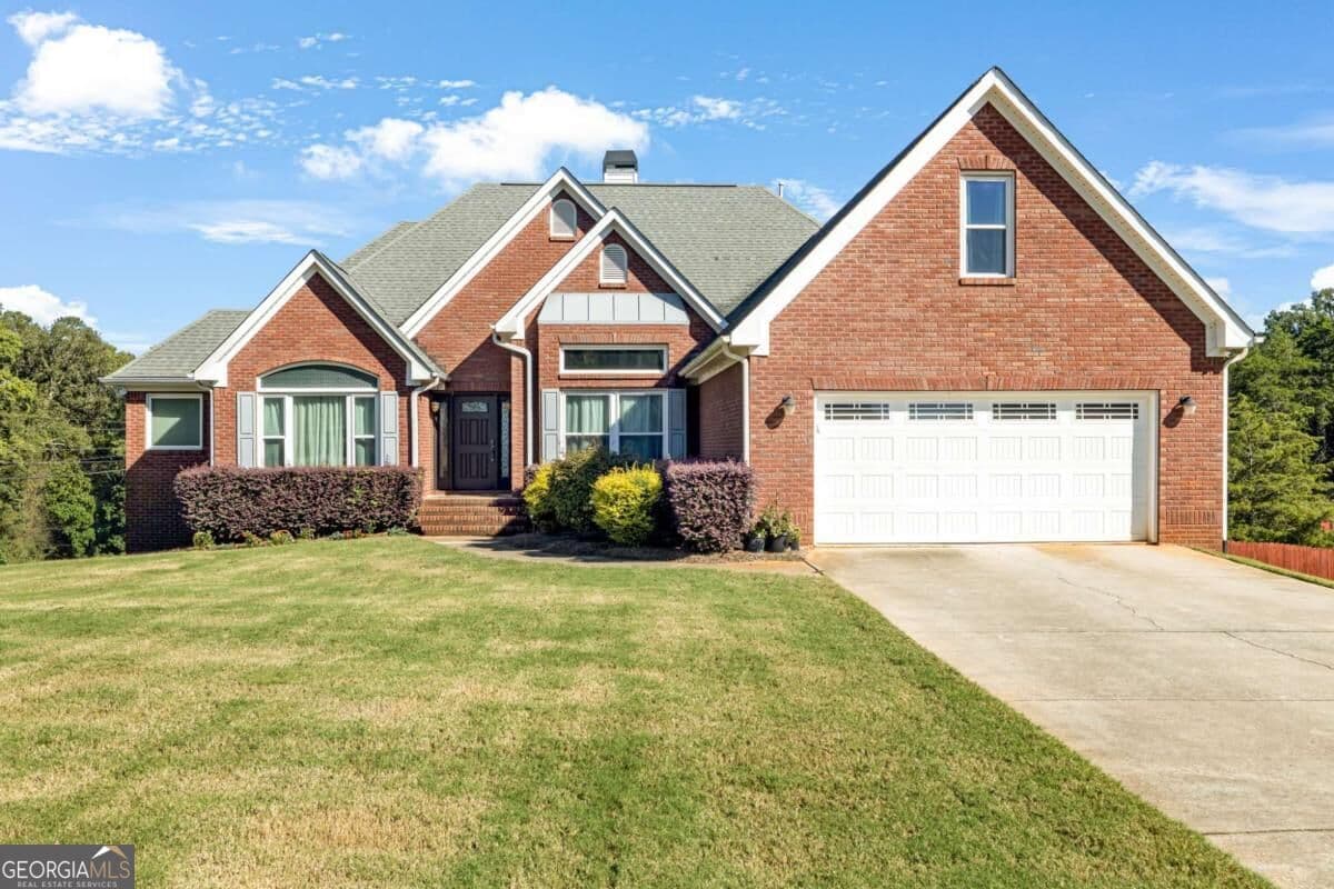5 bedroom, 4 bathroom, 4,874 sq ft single family residence for sale at 1001 Landmark Drive, Mcdonough, GA 30252 — photo 2