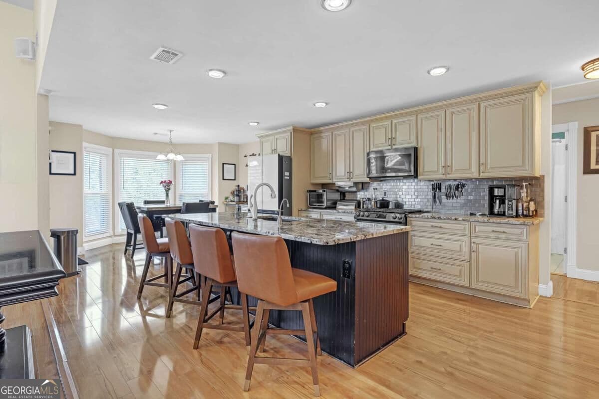 5 bedroom, 4 bathroom, 4,874 sq ft single family residence for sale at 1001 Landmark Drive, Mcdonough, GA 30252 — photo 9