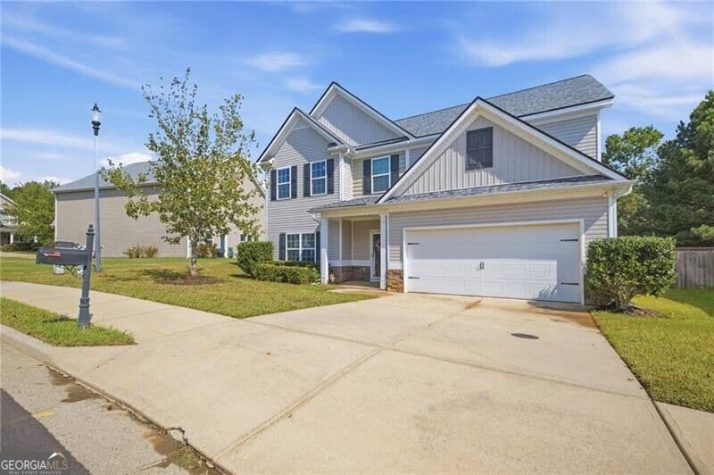 6 bedroom, 3.5 bathroom, 3,372 sq ft single family residence for sale at 603 Stonehurst Lane, Canton, GA 30114 — photo 2