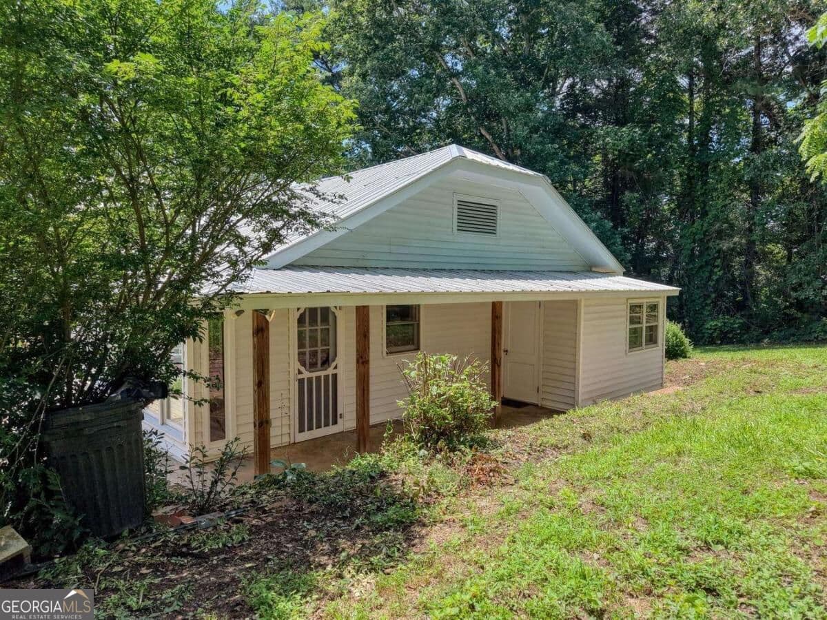 5 bedroom, 3.5 bathroom, 1,670 sq ft single family residence for sale at 94 Madola Road, Epworth, GA 30541 — photo 6