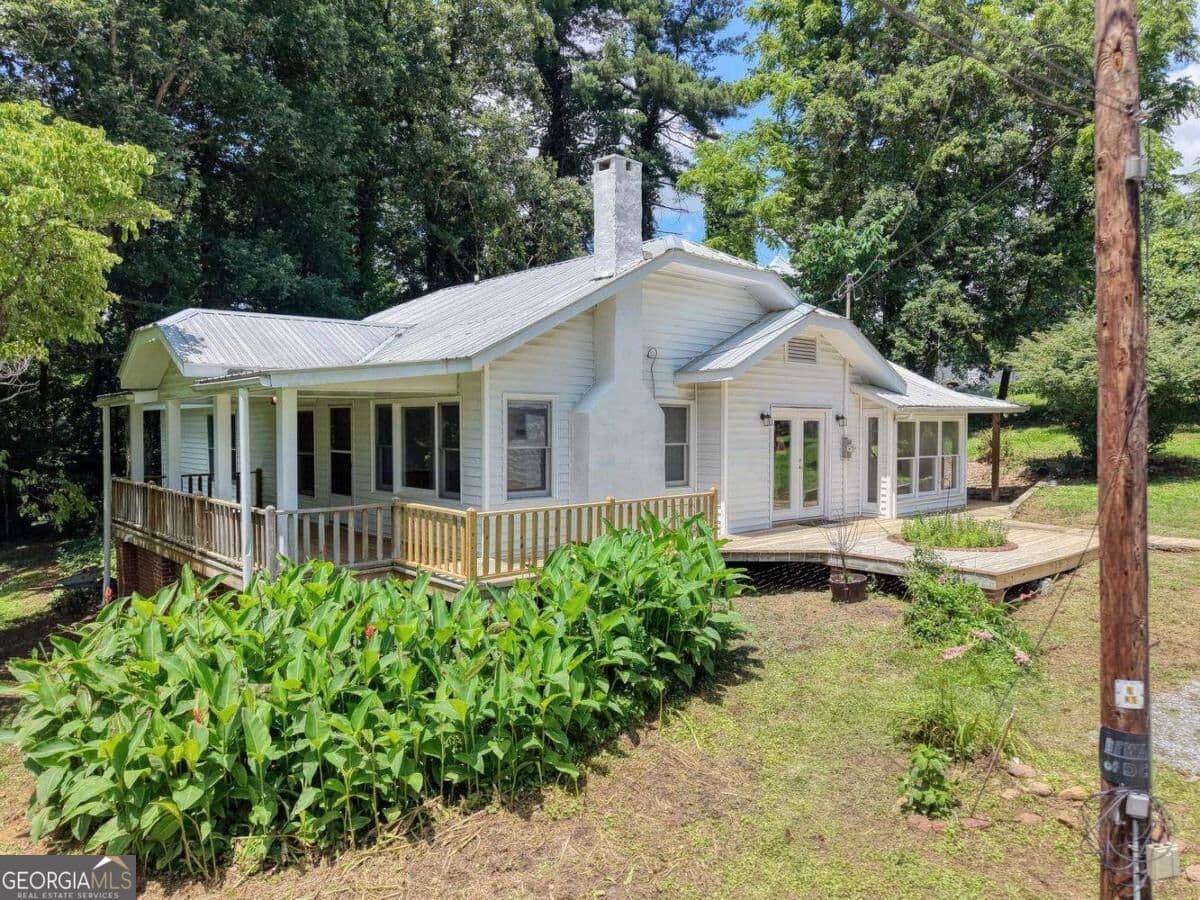 5 bedroom, 3.5 bathroom, 1,670 sq ft single family residence for sale at 94 Madola Road, Epworth, GA 30541 — photo 3
