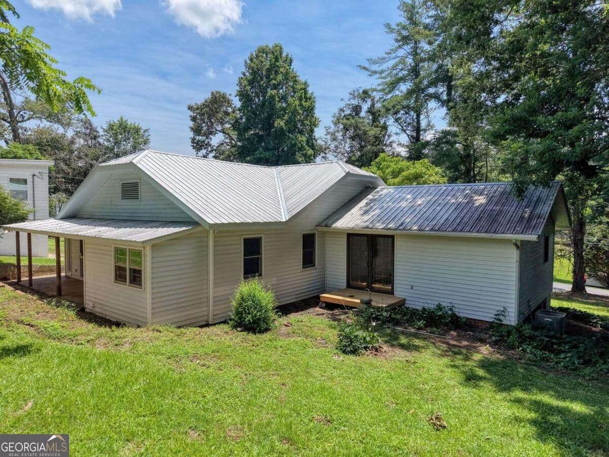 5 bedroom, 3.5 bathroom, 1,670 sq ft single family residence for sale at 94 Madola Road, Epworth, GA 30541 — photo 5