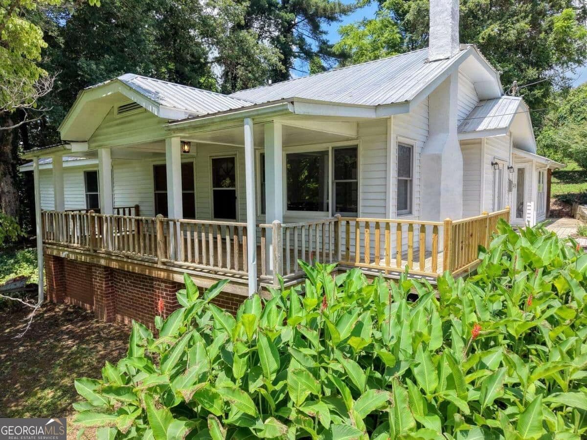 5 bedroom, 3.5 bathroom, 1,670 sq ft single family residence for sale at 94 Madola Road, Epworth, GA 30541 — photo 4