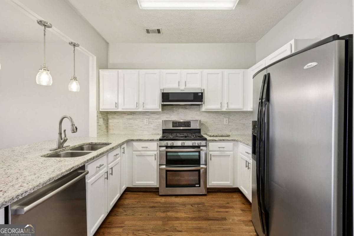 2 bedroom, 2.5 bathroom, 1,398 sq ft townhouse for sale at 1363 Penhurst Drive, Lawrenceville, GA 30043 — photo 9