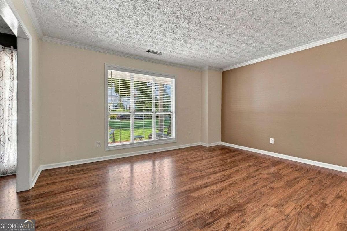 4 bedroom, 2.5 bathroom, 2,900 sq ft single family residence for sale at 9878 Point View Drive, Jonesboro, GA 30238 — photo 6