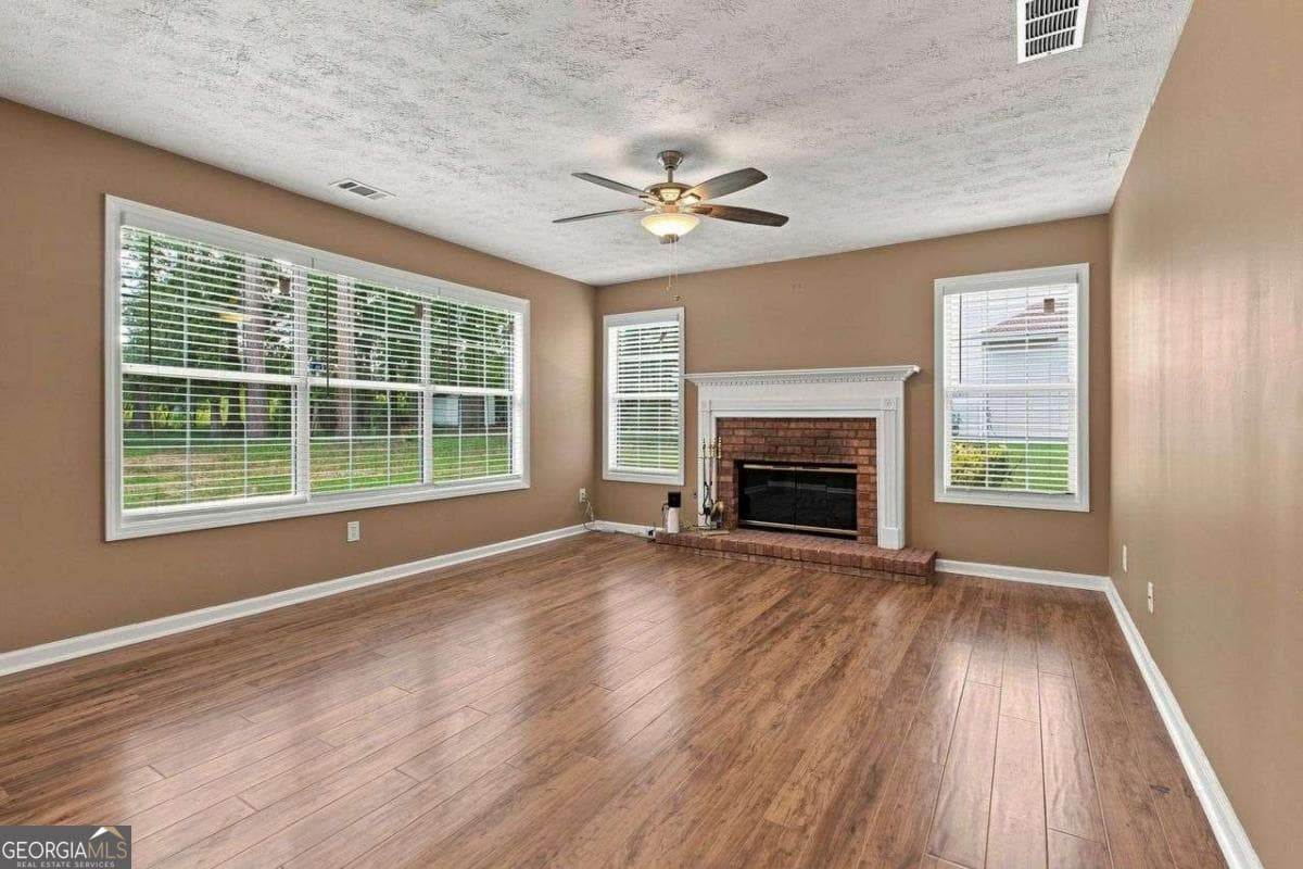 4 bedroom, 2.5 bathroom, 2,900 sq ft single family residence for sale at 9878 Point View Drive, Jonesboro, GA 30238 — photo 8