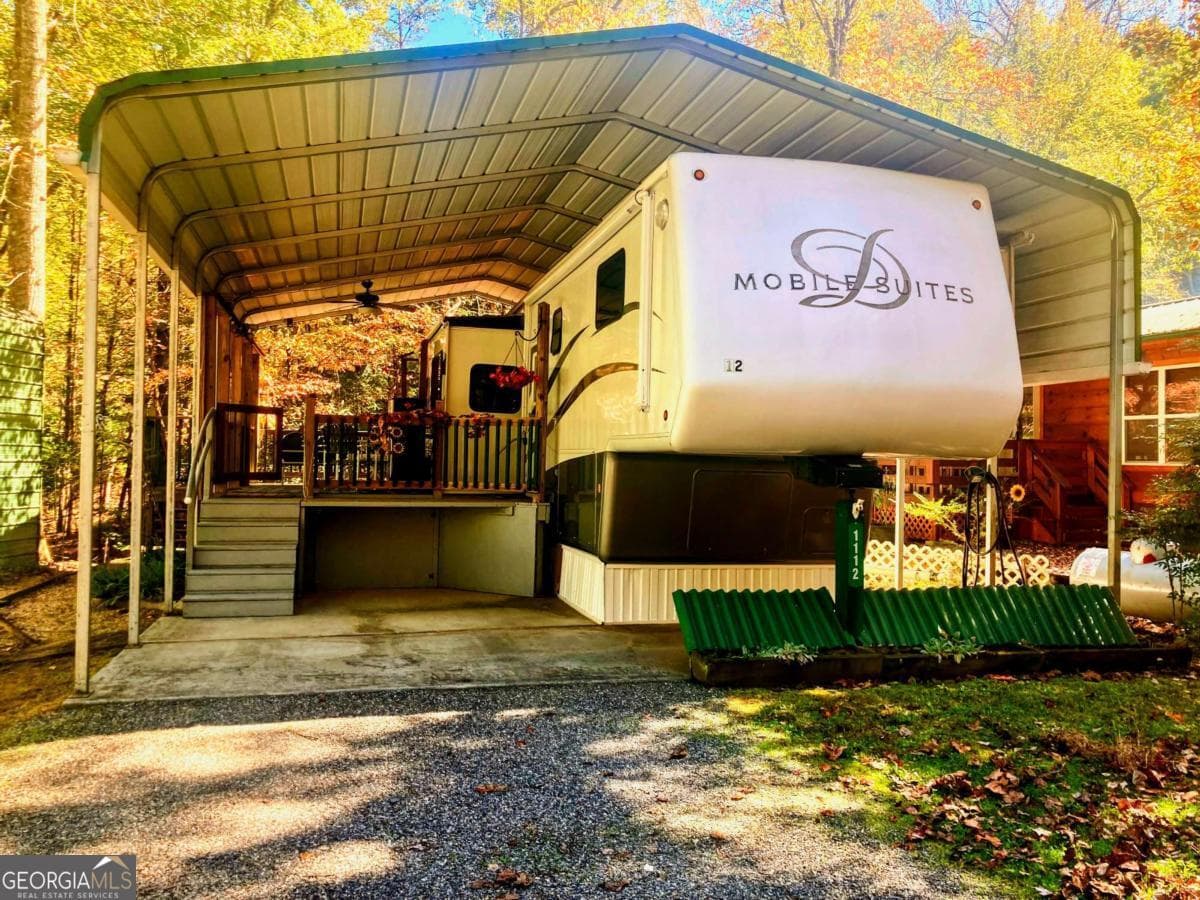 1 bedroom, 1 bathroom, 350 sq ft manufactured home,single family residence for sale at 1112 Creekside Drive 12, Hiawassee, GA 30546 — photo 1 of 25