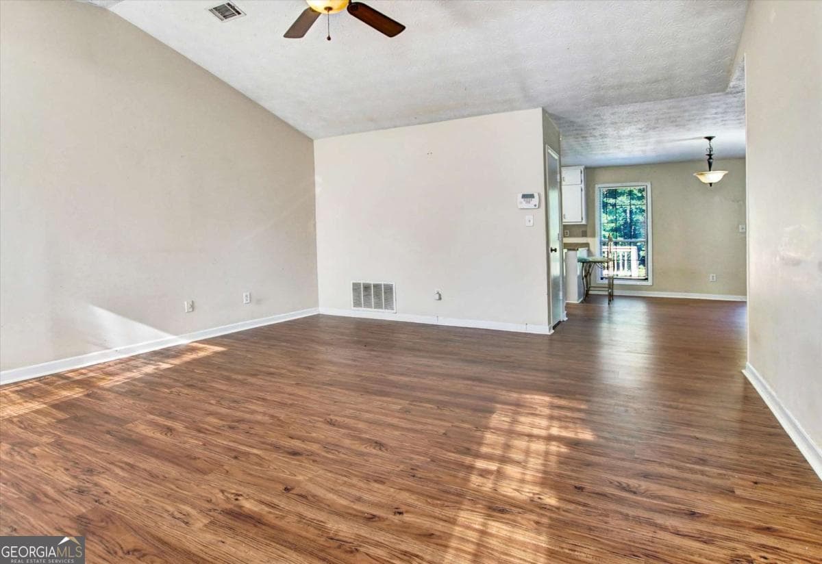 4 bedroom, 2 bathroom, 2,019 sq ft single family residence for sale at 11553 Matthews Trail, Hampton, GA 30228 — photo 2